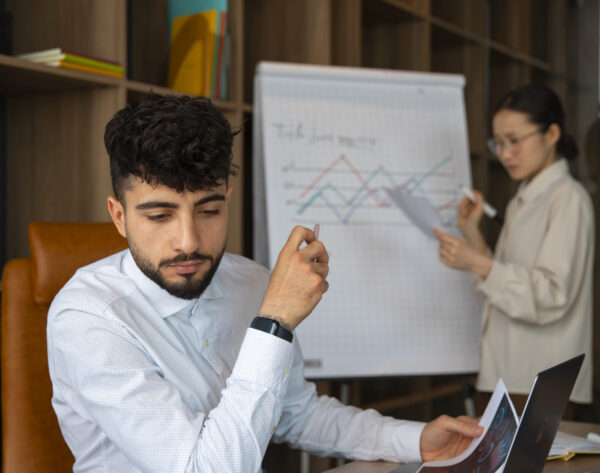 office-workers-using-finance-graphs